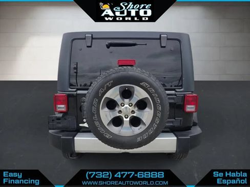 Used 2014 Jeep Wrangler Unlimited Sahara w/ Dual Top Group AWD/4WD image 6