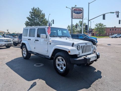 Used 2014 Jeep Wrangler Unlimited Sahara AWD/4WD image 1