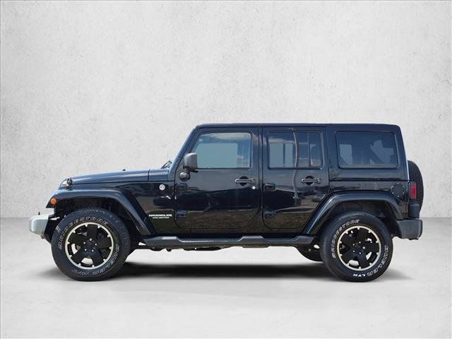 Used 2012 Jeep Wrangler Unlimited Sahara AWD/4WD image 9
