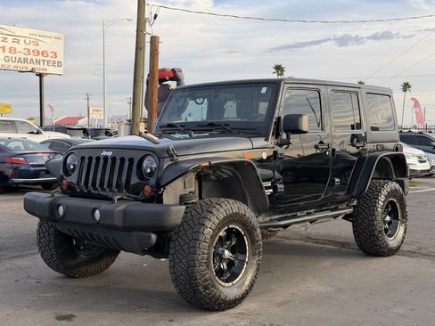 Used 2012 Jeep Wrangler Unlimited Sport image 2