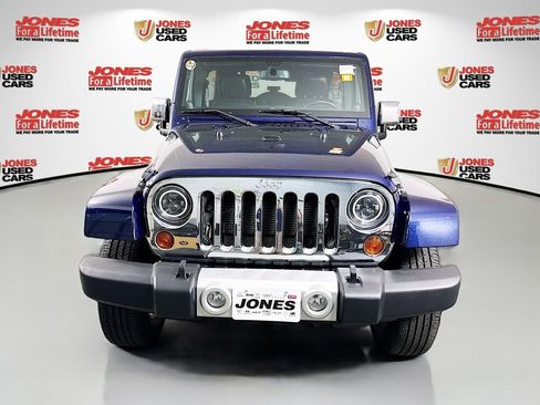 Used 2013 Jeep Wrangler Unlimited Sahara w/ Dual Top Group AWD/4WD image 11