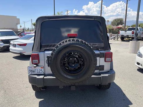 Used 2014 Jeep Wrangler Unlimited Sport w/ Connectivity Group AWD/4WD image 3