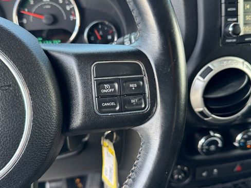 Used 2015 Jeep Wrangler Unlimited Sahara w/ Dual Top Group AWD/4WD image 23