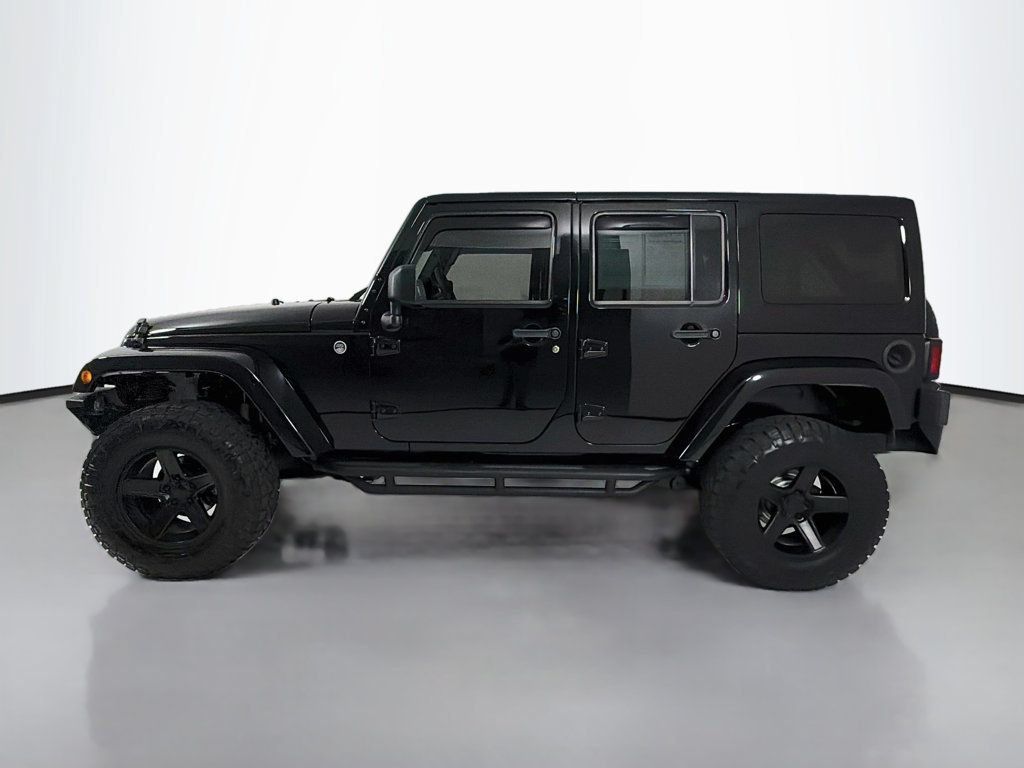 Used 2013 Jeep Wrangler Unlimited Sahara w/ Connectivity Group AWD/4WD image 4