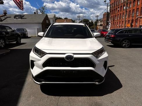 Used 2021 Toyota RAV4 SE w/ Weather & Moonroof Package AWD/4WD image 2