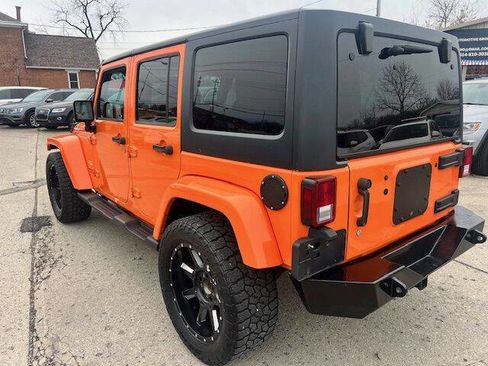 Used 2012 Jeep Wrangler Unlimited Sahara w/ Dual Top Group image 4