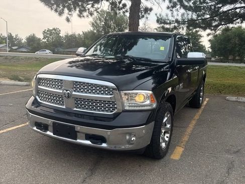 Used 2014 RAM 1500 Laramie w/ Convenience Group AWD/4WD image 1