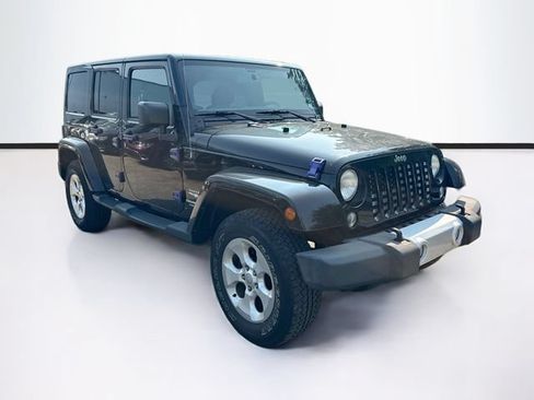 Used 2014 Jeep Wrangler Unlimited Sahara w/ Max Tow Package AWD/4WD image 1