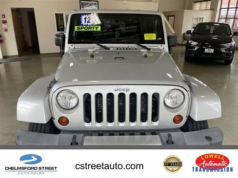 Used 2012 Jeep Wrangler Unlimited Sahara w/ Dual Top Group AWD/4WD image 1