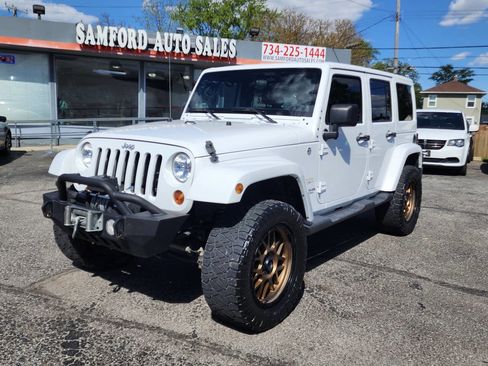 Used 2012 Jeep Wrangler Unlimited Sahara w/ Trailer Tow Group AWD/4WD image 6