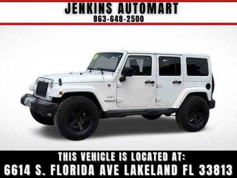 Used 2015 Jeep Wrangler Unlimited Sahara w/ Dual Top Group AWD/4WD image 1