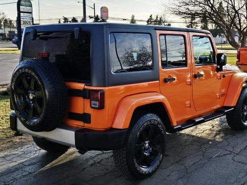 Used 2012 Jeep Wrangler Unlimited Sahara w/ Dual Top Group image 6