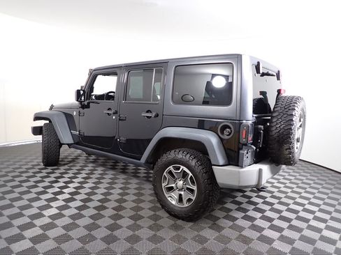 Used 2014 Jeep Wrangler Unlimited Rubicon w/ Dual Top Group AWD/4WD image 9