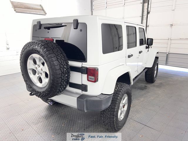 Used 2014 Jeep Wrangler Unlimited Sahara w/ Dual Top Group AWD/4WD image 7