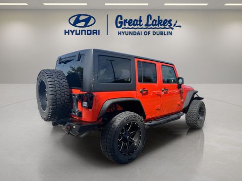 Used 2015 Jeep Wrangler Unlimited Sahara w/ Dual Top Group AWD/4WD image 6