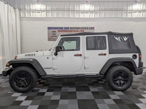 Used 2015 Jeep Wrangler Unlimited Sport image 1