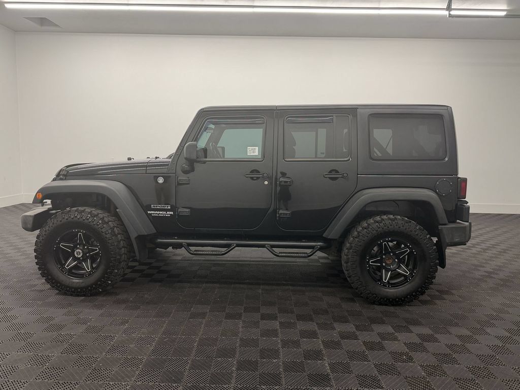 Used 2012 Jeep Wrangler Unlimited Sport w/ PWR Convenience Group AWD/4WD image 2