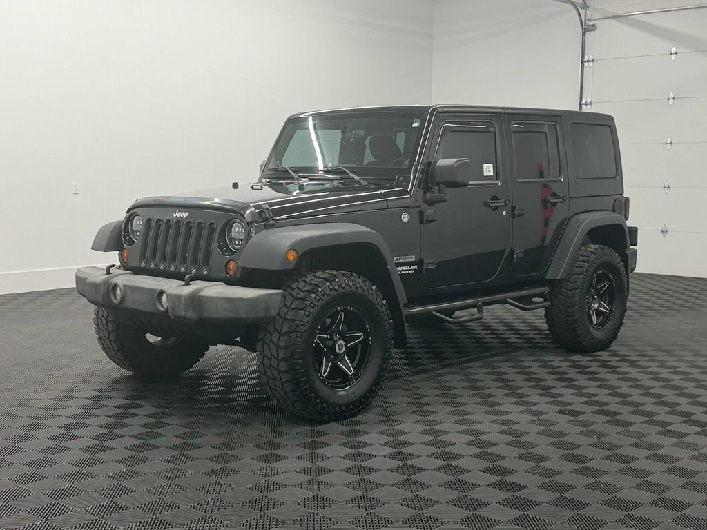 Used 2012 Jeep Wrangler Unlimited Sport w/ PWR Convenience Group AWD/4WD image 1