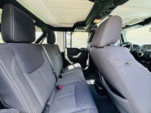 Used 2013 Jeep Wrangler Unlimited Sahara w/ Connectivity Group AWD/4WD image 14
