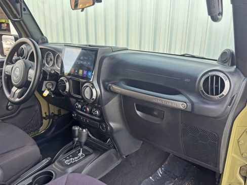 Used 2013 Jeep Wrangler Unlimited Sport w/ Mopar Black Appearance Group image 13