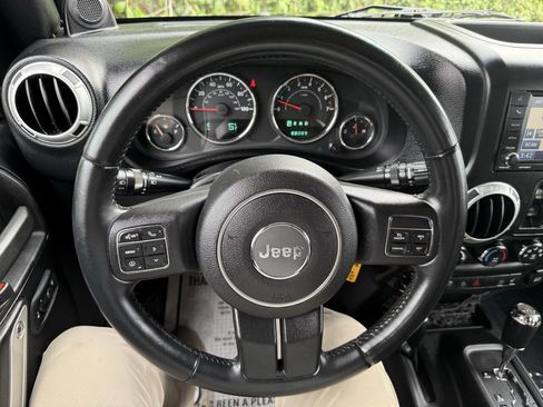 Used 2012 Jeep Wrangler Unlimited Sahara w/ Connectivity Group AWD/4WD image 29