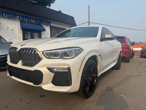 Used 2021 BMW X6 M50i w/ Executive Package AWD/4WD image 1