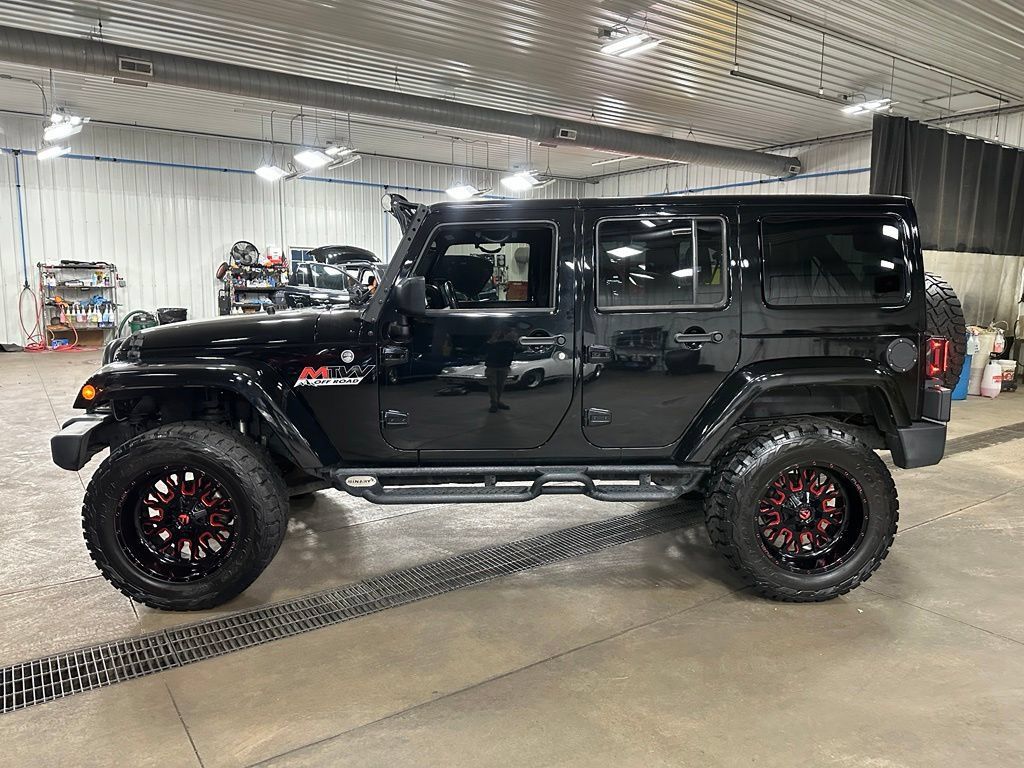 Used 2015 Jeep Wrangler Unlimited Sahara w/ Connectivity Group AWD/4WD image 35