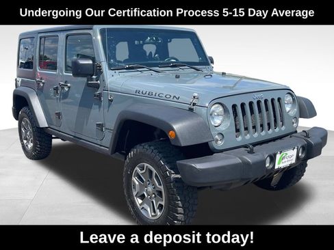 Used 2014 Jeep Wrangler Unlimited Rubicon w/ Connectivity Group AWD/4WD image 1