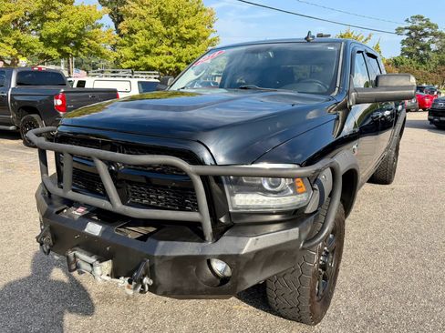 Used 2014 RAM 2500 Laramie w/ Black Appearance Group AWD/4WD image 1