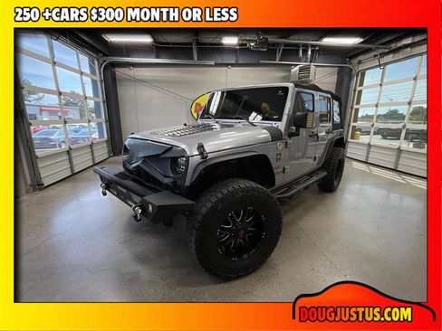Used 2015 Jeep Wrangler Unlimited Sahara AWD/4WD image 1