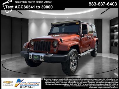 Used 2014 Jeep Wrangler Unlimited Sahara w/ Dual Top Group