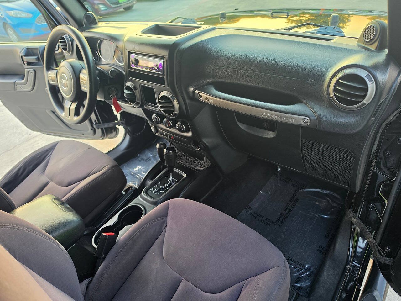 Used 2013 Jeep Wrangler Sport AWD/4WD image 22