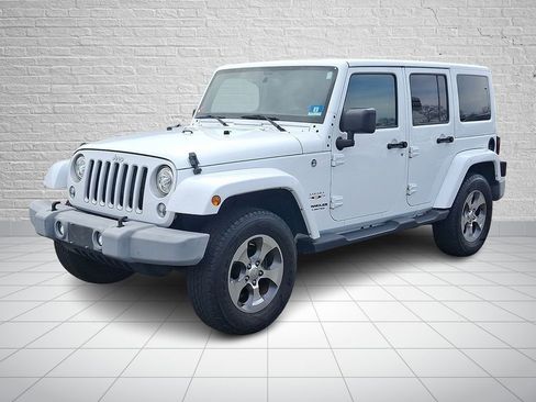 Used 2017 Jeep Wrangler Unlimited Sahara w/ Dual Top Group AWD/4WD image 1