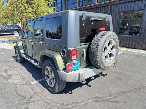 Used 2009 Jeep Wrangler Unlimited Sahara w/ Dual Top Group AWD/4WD image 2