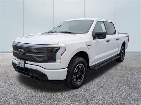 Used 2023 Ford F150 Lightning XLT AWD/4WD image 1
