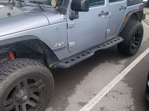 Used 2016 Jeep Wrangler Unlimited Sahara w/ Connectivity Group image 1