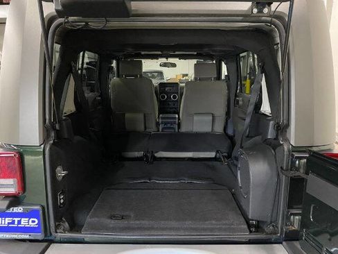 Used 2010 Jeep Wrangler Unlimited Sahara w/ Dual Top Group image 14