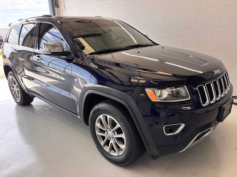 Used 2014 Jeep Grand Cherokee Limited AWD/4WD image 1