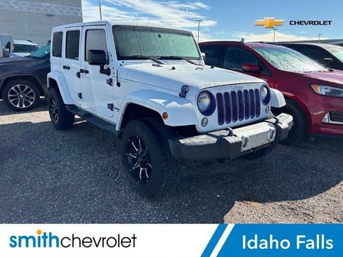 Used 2015 Jeep Wrangler Unlimited Sahara w/ Dual Top Group AWD/4WD image 1