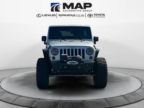 Used 2010 Jeep Wrangler Unlimited Rubicon w/ Dual Top Group image 8