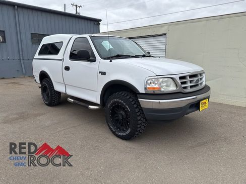 Used 1999 Ford F150 XLT AWD/4WD image 1