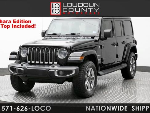Used 2019 Jeep Wrangler Unlimited Sahara w/ Dual Top Group AWD/4WD image 1