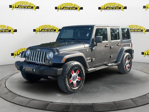 Used 2017 Jeep Wrangler Unlimited Sahara w/ Max Tow Package AWD/4WD image 1