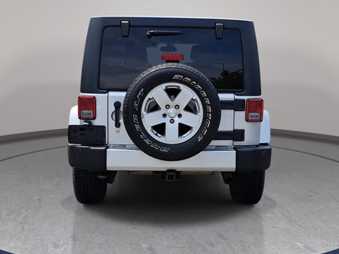 Used 2012 Jeep Wrangler Unlimited Sahara w/ Dual Top Group AWD/4WD image 6