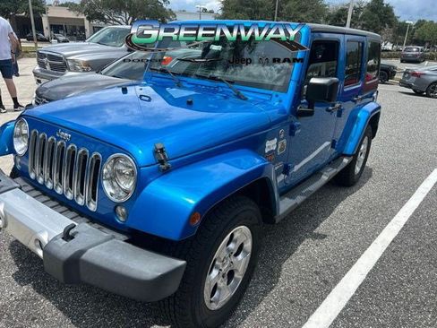 Used 2015 Jeep Wrangler Unlimited Sahara AWD/4WD image 1
