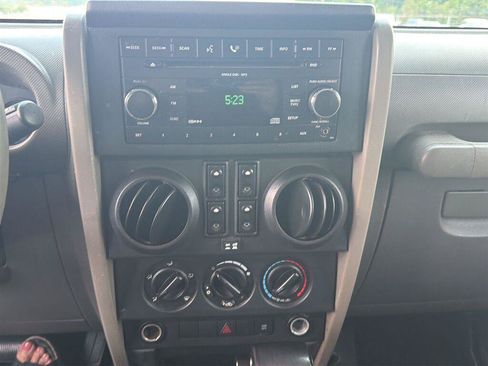 Used 2009 Jeep Wrangler Unlimited X w/ Black Appearance Group AWD/4WD image 11