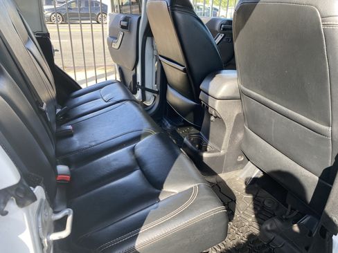 Used 2014 Jeep Wrangler Unlimited Sahara w/ Dual Top Group AWD/4WD image 16