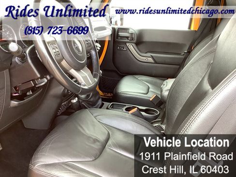 Used 2013 Jeep Wrangler Unlimited Sahara w/ Dual Top Group AWD/4WD image 12