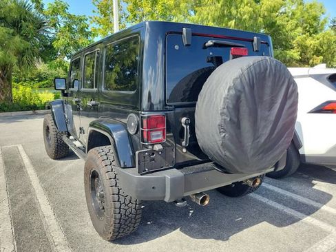 Used 2015 Jeep Wrangler Unlimited Sahara w/ Dual Top Group AWD/4WD image 4