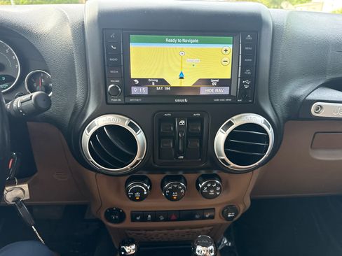 Used 2016 Jeep Wrangler Unlimited Sahara w/ Max Tow Package AWD/4WD image 19